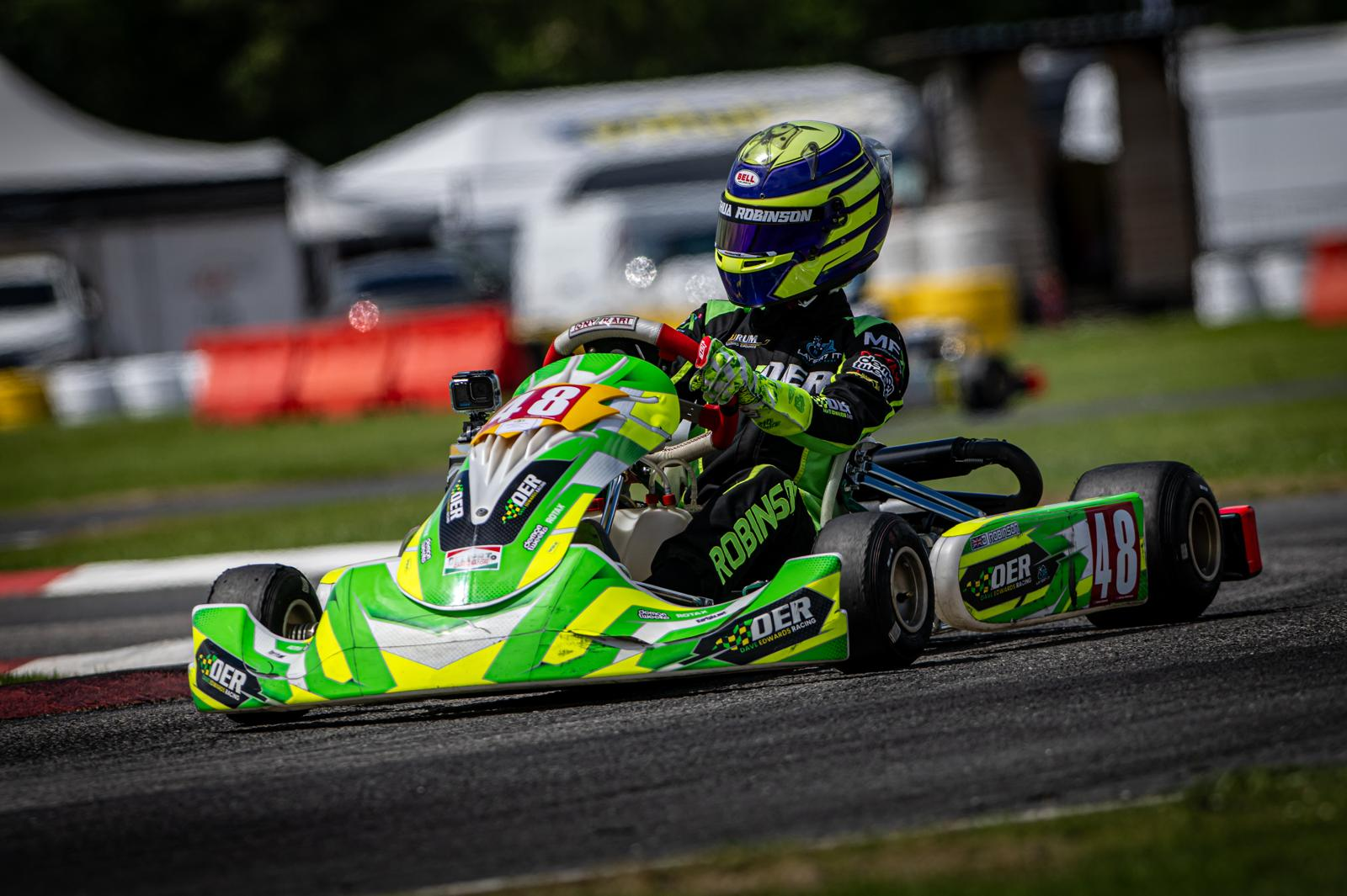 DER kart racing in a pack